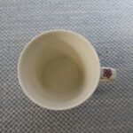 Arabia Folkhälsan Majblomman muki 0,3 l Teema malli.