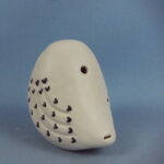 Punainen paja Pöllöpilli valkoinen.