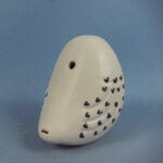 Punainen paja Pöllöpilli valkoinen.