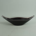 Kumela Taidelasimalja lila Armando Jacobino.