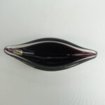 Kumela Taidelasimalja lila Armando Jacobino.