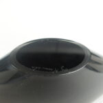 Kumela Taidelasimalja lila Armando Jacobino.