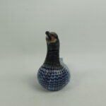 Nuutajärven lasi Mustakurkku-uikku taidelasilintu.