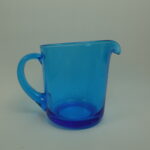 Nuutajärven lasi Lasikaadin 75 cl turkoosi.