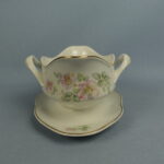 Arabia Koiranruusu kastikeastia FQ-malli.