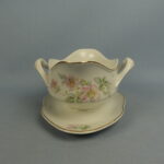 Arabia Koiranruusu kastikeastia FQ-malli.