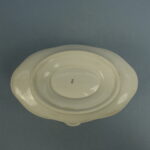 Arabia Koiranruusu kastikeastia FQ-malli.